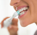 Teeth cleaning guide with Oral B electric toothbrush